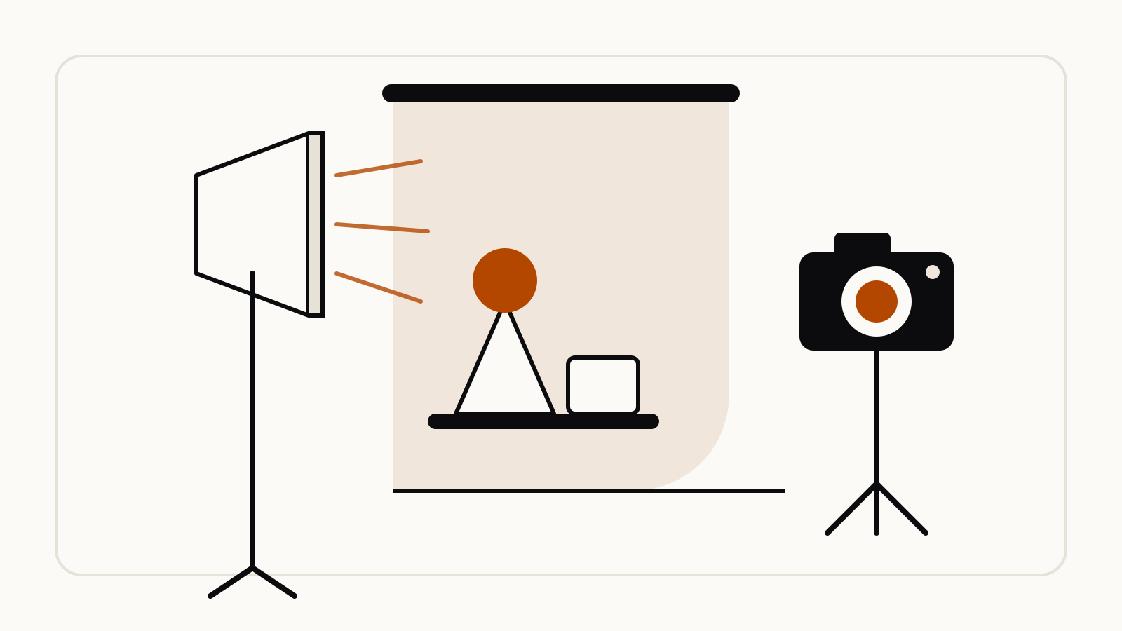 A photo studio set with a softbox light, a backdrop, product props on stands and a camera on a tripod